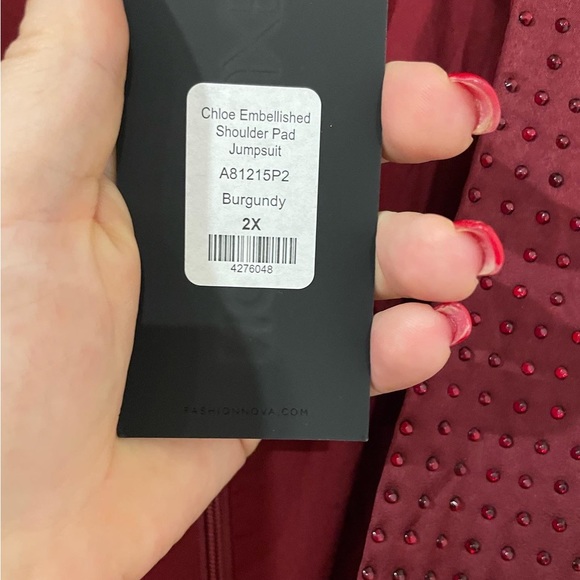 Embellished shoulder pad jumpsuit never worn with tags. - Picture 4 of 4